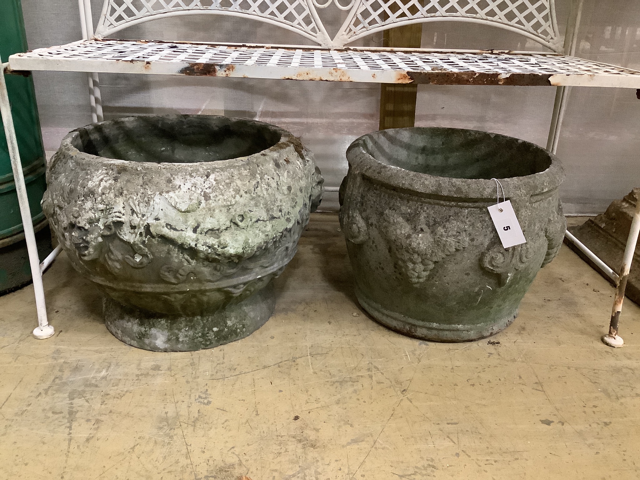Two reconstituted stone garden planters, larger width 47cm